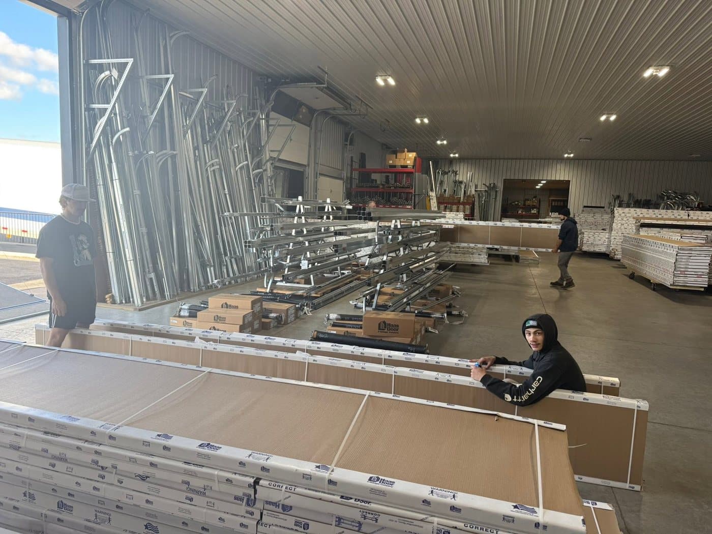 Behind the scenes — prepping doors and hardware for delivery.